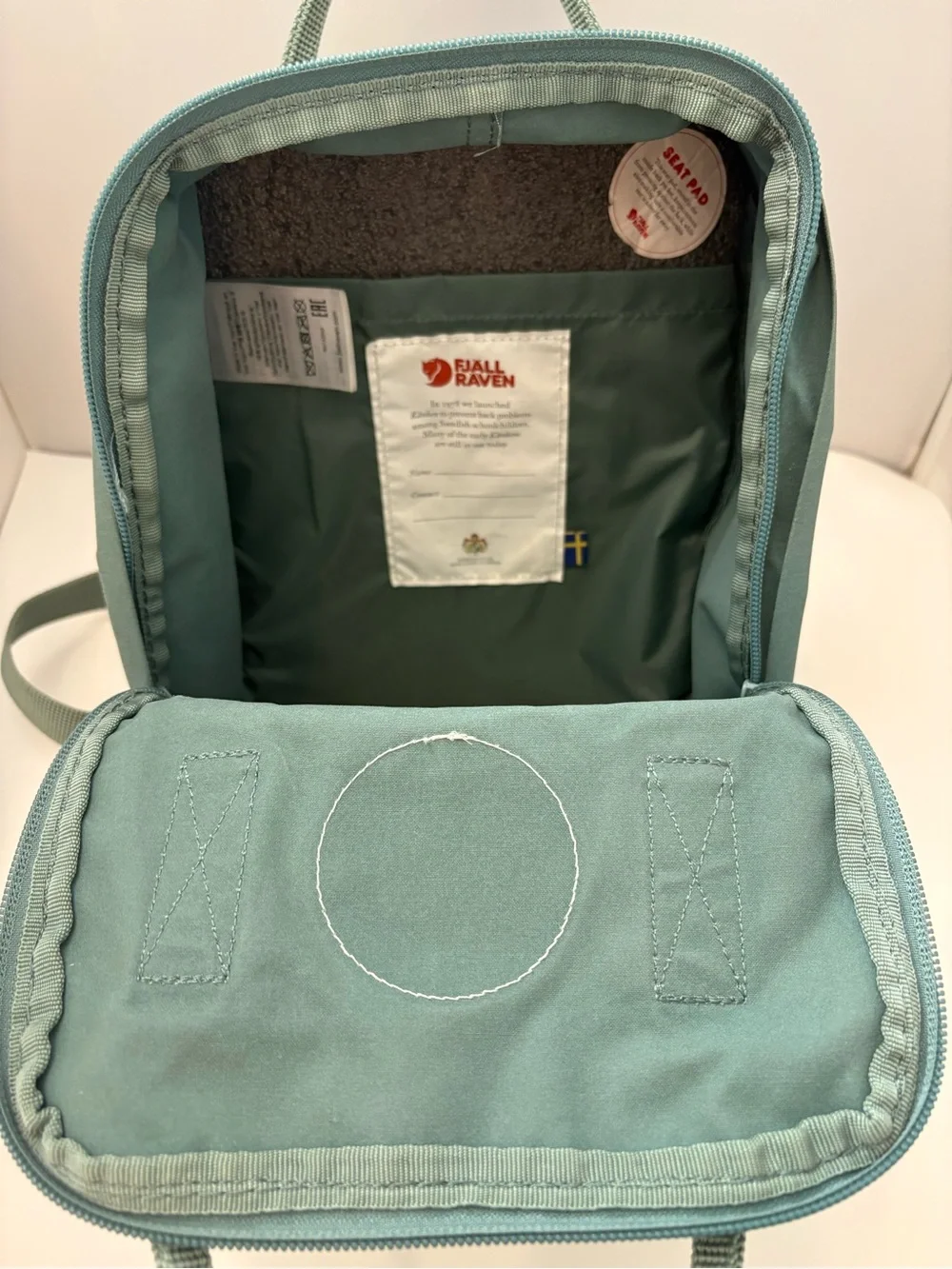 Fjallraven Kanken Mini Backpack in Sage Green with Red Logo